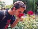 Maciej not too impressed by the scent of the roses.